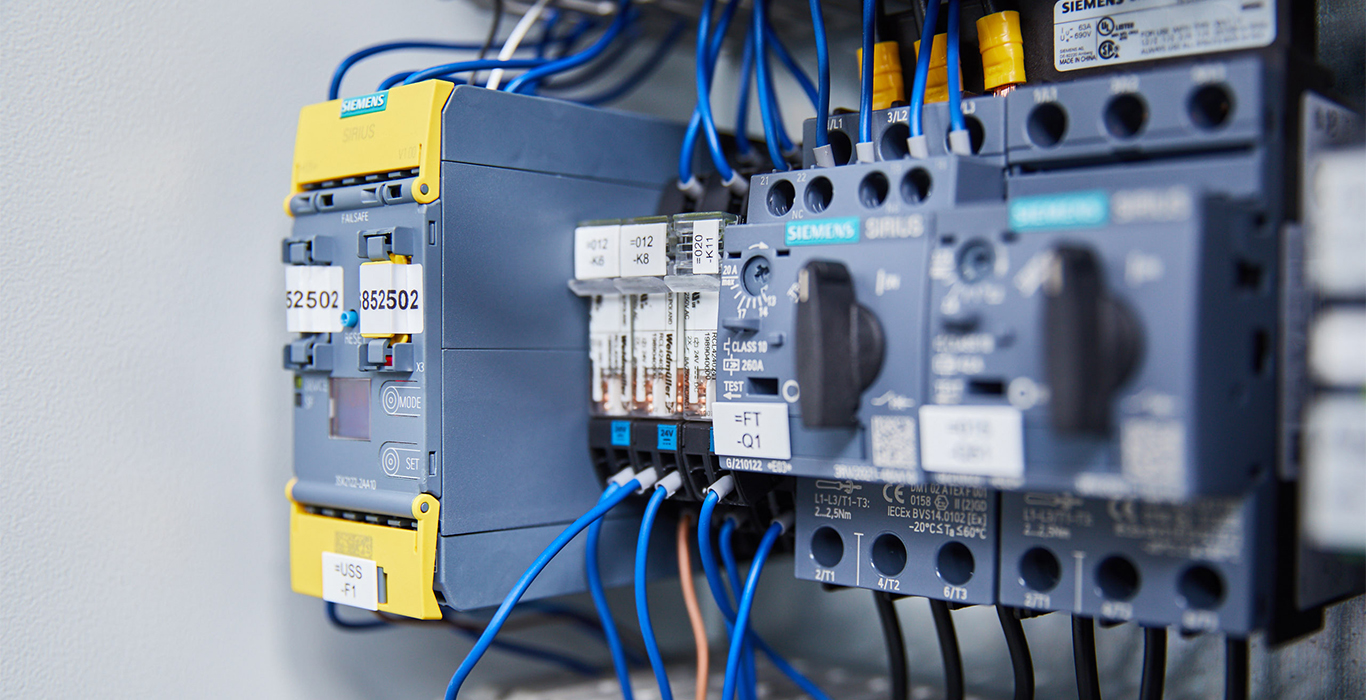 Interior of a control cabinet of a filling unit