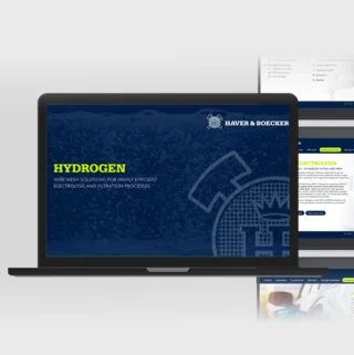 A laptop displaying the cover page of the Engineer's Guide with the title “Hydrogen,” with screenshots of the content in the background.