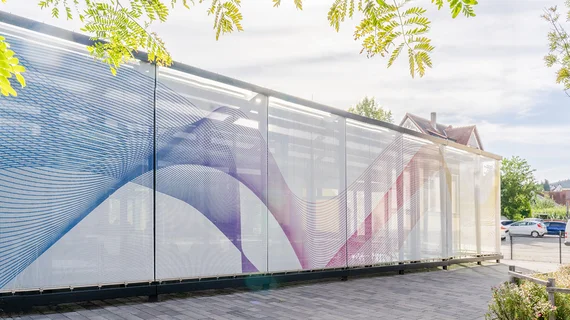 Stainless steel wire mesh facade with digital printing.