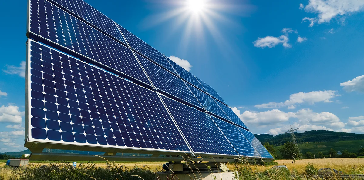Solar collectors on a meadow