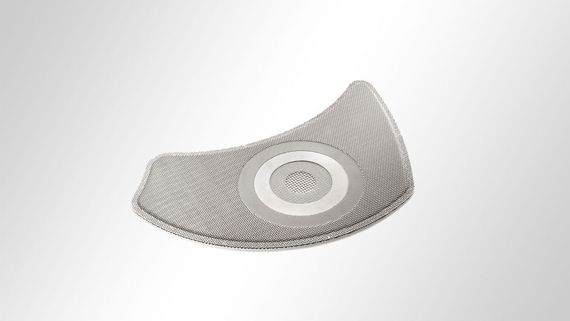 Tamis d'extrusion : multicouche, en forme de rein et avec compression des bords.