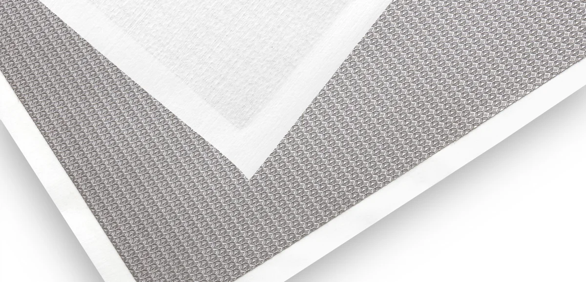 Design mesh cut with white non-woven backing