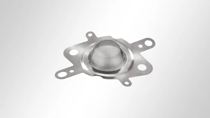 Pièce emboutie avec élément de montage