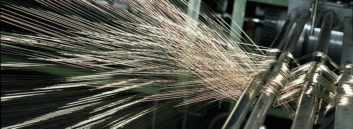 Processing of warp wires in the bottoming-device department