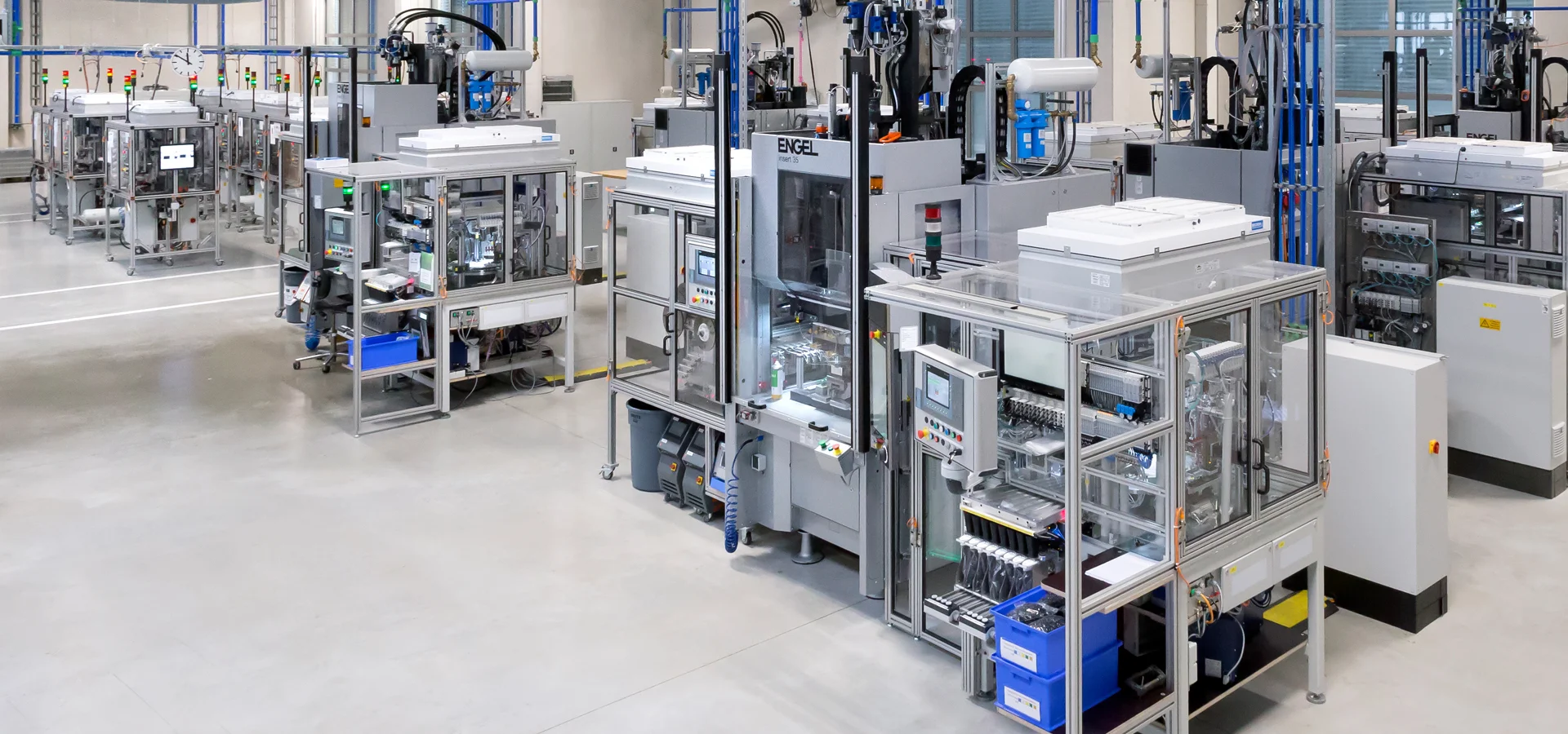 Ligne de production pour le moulage par injection de plastique