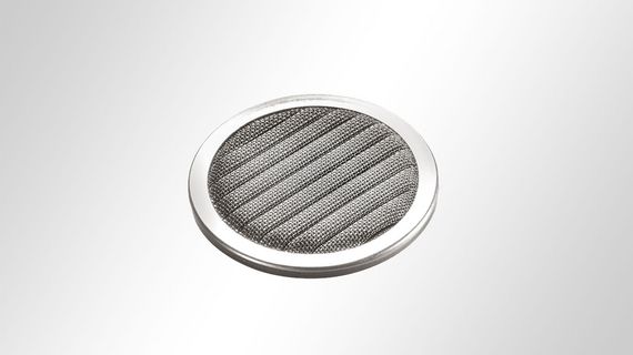 Filtre à filtières : disque à toile filtrante plissée et bordure métallique
