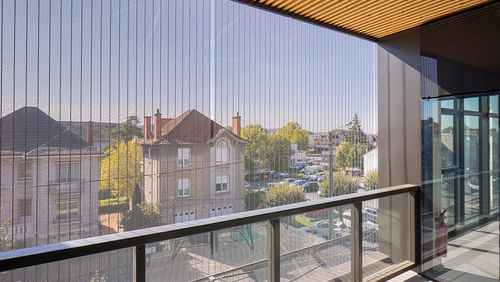 Sun protection facade made of metal mesh – Haver & Boecker
