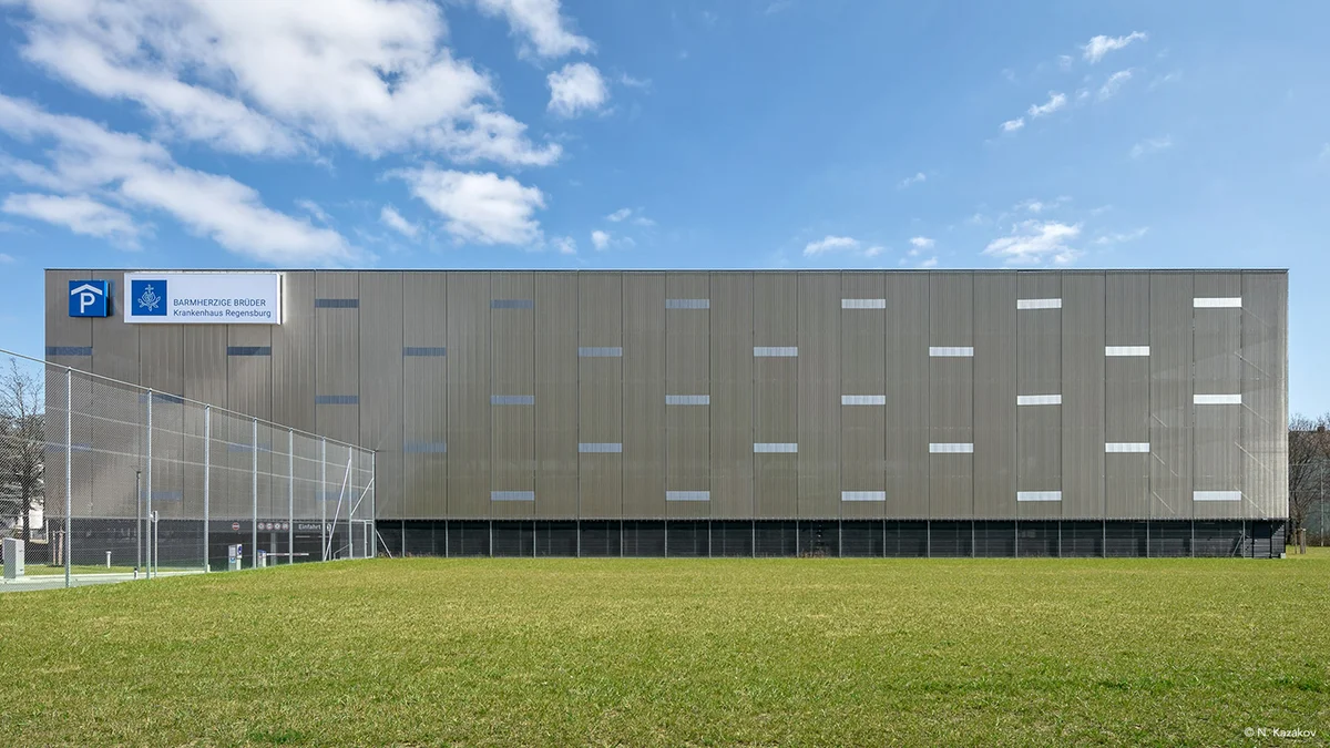 Multi-storey car park cladding using architectural wire mesh
